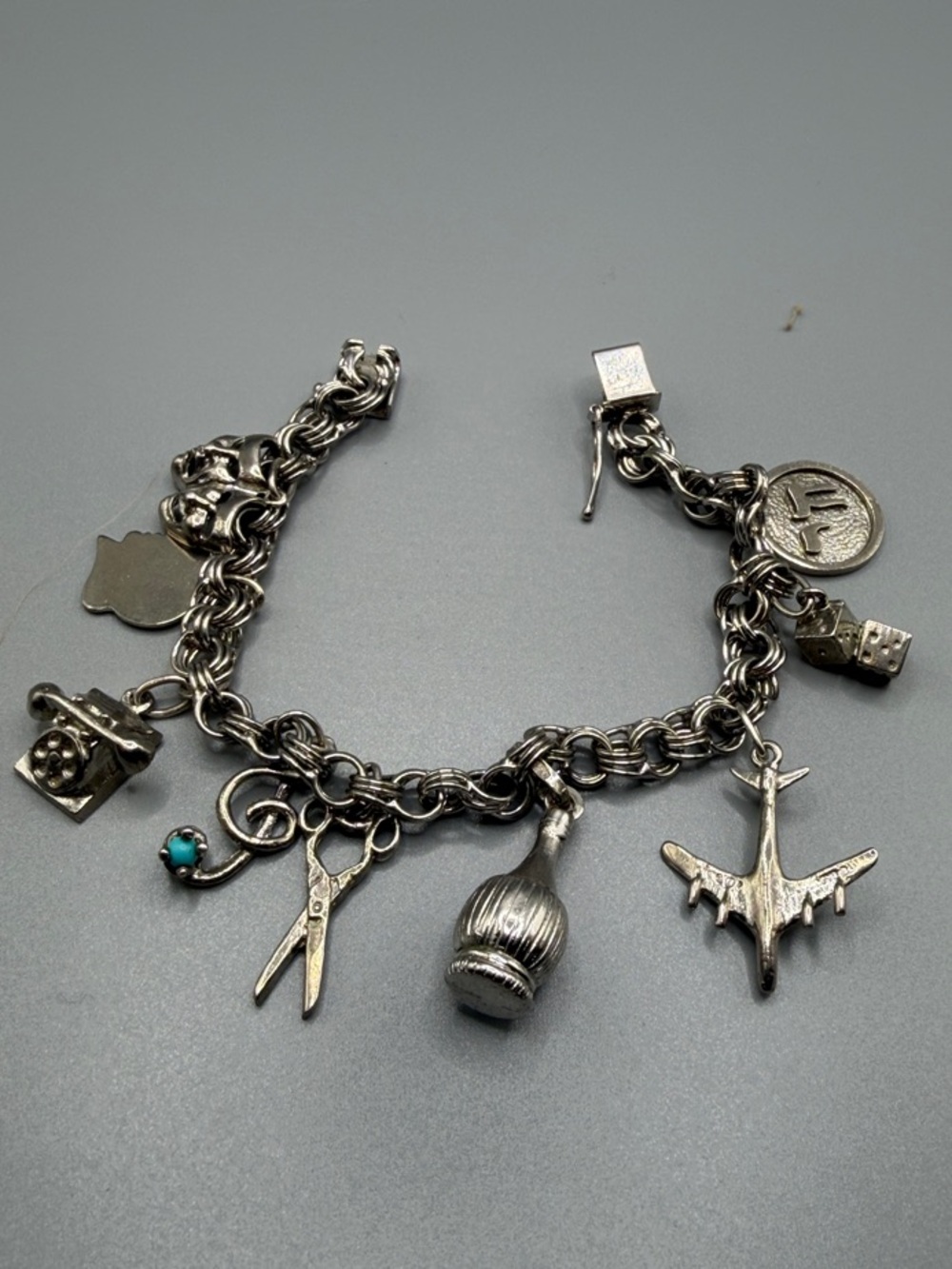 Silver Charm Bracelet with Travel & Beauty Charms